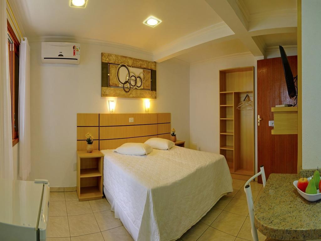 Morada Do Sol Apart Hotel Гаропаба Номер фото